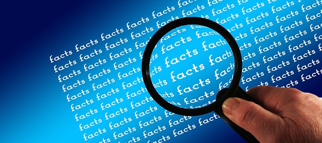 Photo of magnifying glass hovering over the word 'fact' in an article on the Church of Christ Santa Clara SSCOC Truthseekers