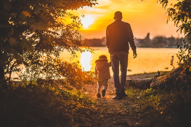 Photo of a father and child on a path in an article by the Church of Christ at Santa Clara.