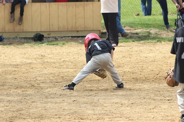Photo of a child playing t-ball